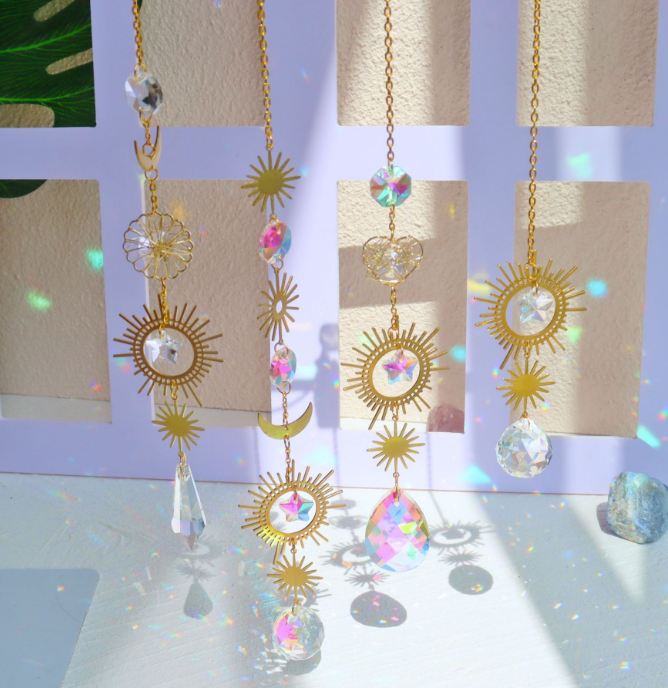 Add a touch of positivity and joy to your home with our Golden Crystal Mood Enhancing Sun Catchers. These stunning sun catchers are designed to enhance your mood and uplift your spirit, making them the perfect addition to any room. Let the golden crystals refract light and positive vibes into your space.