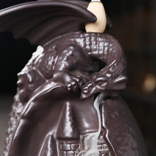 Transform your space into a tranquil oasis with our European Ceramic Dragon Back Flow Incense Burner. The intricately designed dragon allows for a mesmerizing back flow effect, providing a soothing and calming atmosphere. Perfect for relaxation, meditation, or adding a touch of elegance to any room.