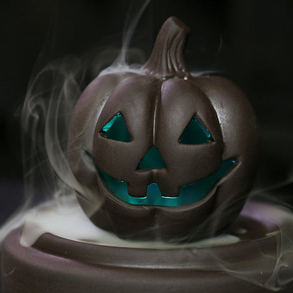 Elevate your Halloween ambiance with the Halloween Pumpkin Backflow Incense Burner. Crafted to create a mesmerizing smoke waterfall effect, it transforms your favorite incense cones into a captivating display.