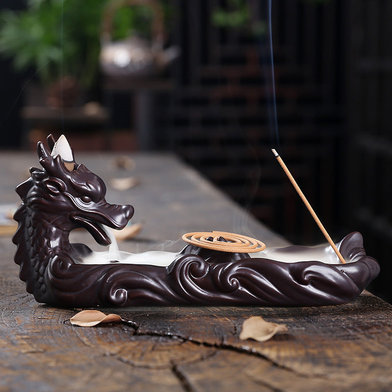 Experience the captivating aroma of burning incense with this stunning Ceramic Backflow Aromatherapy Dragon Incense Burner. Crafted from high-quality ceramic and featuring a majestic dragon design, this incense burner is the perfect way to enhance the atmosphere in any room.