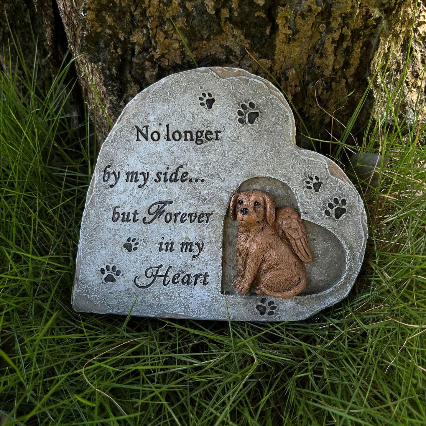 Celebrate the life and love you enjoyed from your furry friend with our Heart Shaped Resin Dog Monument. This beautiful tribute is lovingly crafted in the shape of a heart, symbolizing the eternal bond between you and your beloved pet. Made with high-quality resin, it's a lasting and heartfelt tribute to treasure.