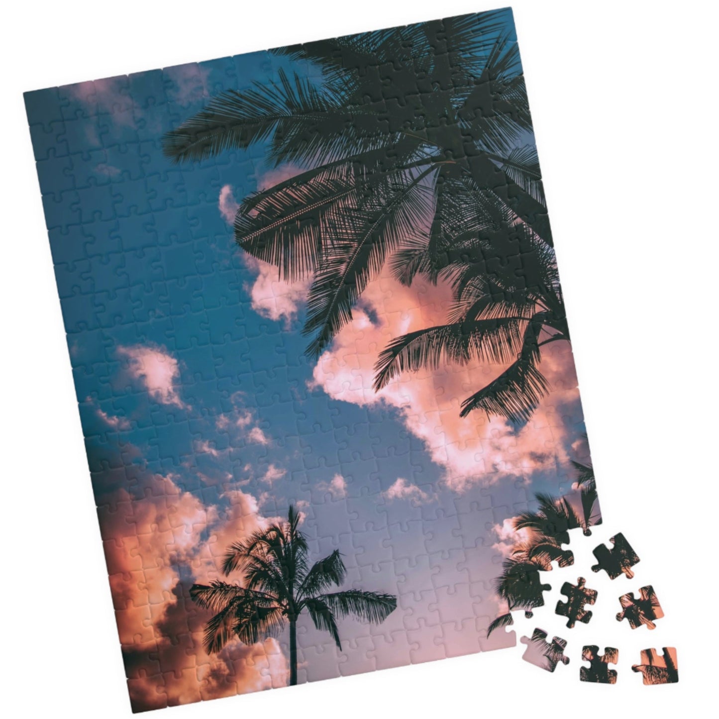 Indulge in the ultimate luxury puzzle experience with our Pink Clouds Palm Trees Puzzle. With 110 to 1014 pieces, this puzzle features a dreamy pink sky and lush palm trees, transporting you to a world of relaxation. Perfect for both puzzle enthusiasts and art lovers, this puzzle is a must-have for your collection.