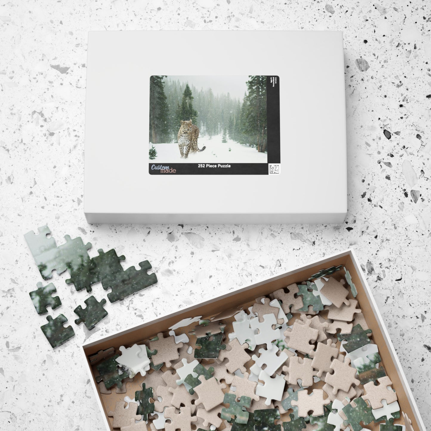 Take on the challenge of this Leopard In A Snow Storm Puzzle! With 110 to 1014 pieces, this puzzle will put your skills to the test as you piece together a stunning image of a leopard in its natural habitat.