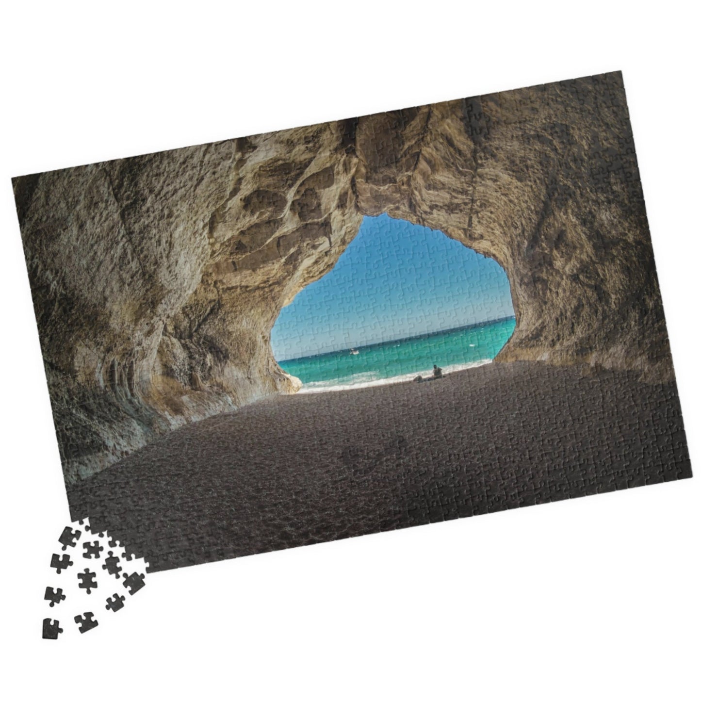 Unleash your inner adventurer with our Cave At The Beach puzzle! This quirky puzzle features 110 to 1014 pieces that will challenge and entertain you for hours. Escape to the beach and get lost in the beautiful and mysterious cave depicted in this puzzle.