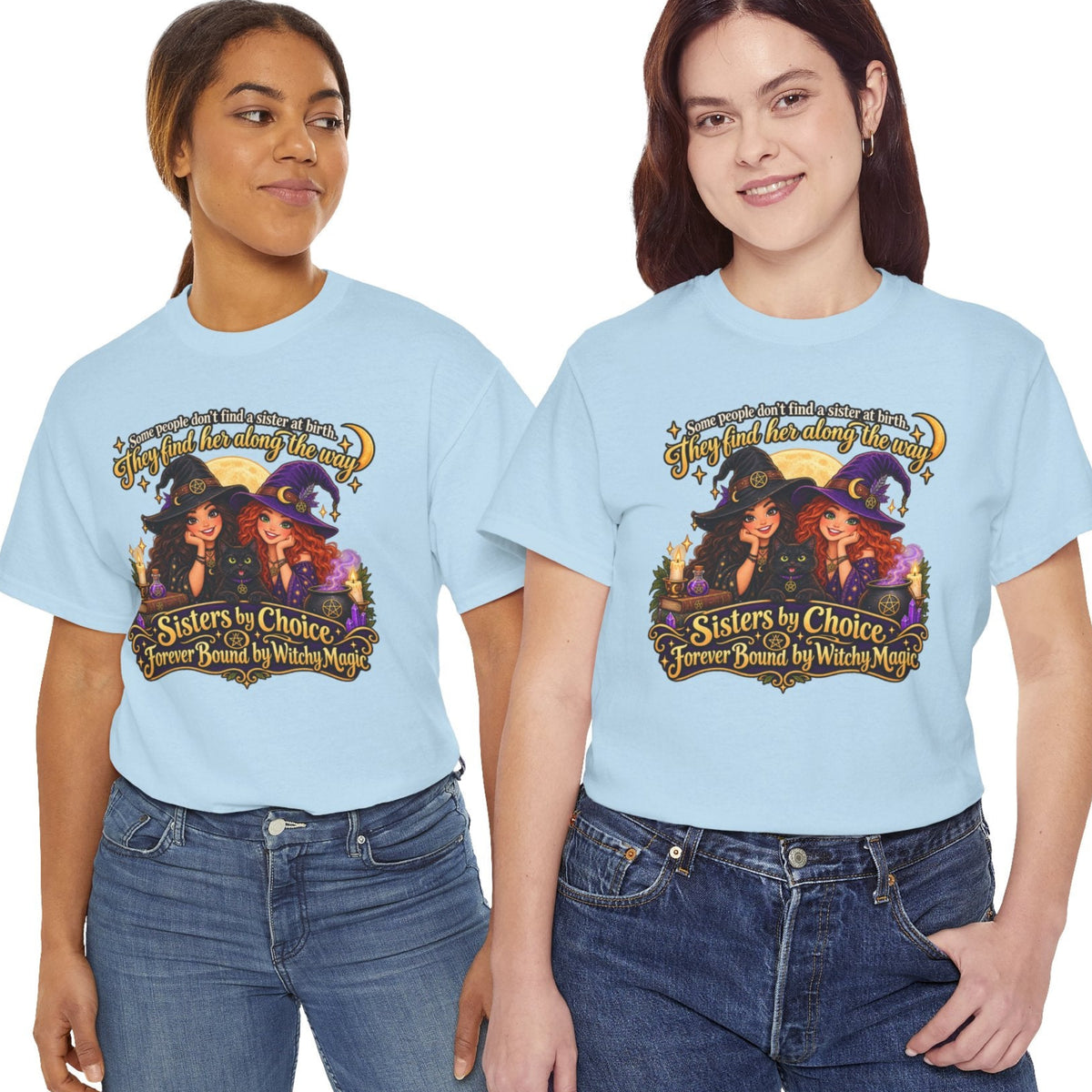 Two women modeling matching light blue graphic T-shirts against a plain white background. The shirts feature a colorful printed design with witches, a crescent moon, and the text 'Sisters by Choice' and 'Forever Bound by Witch Magic.