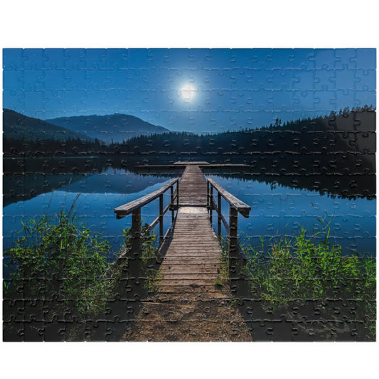 Experience the calming beauty of the Blue Moon At The Lake Puzzle. With 110 to 1014 pieces, this puzzle is perfect for all levels. Immerse yourself in the artistry of the blue moon reflecting on the serene lake, and feel the peace and tranquility it brings. A delightful challenge for any puzzle enthusiast.