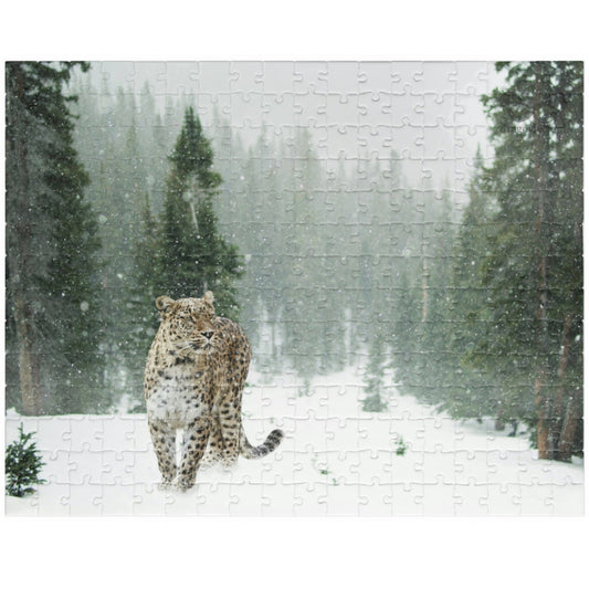 Take on the challenge of this Leopard In A Snow Storm Puzzle! With 110 to 1014 pieces, this puzzle will put your skills to the test as you piece together a stunning image of a leopard in its natural habitat.