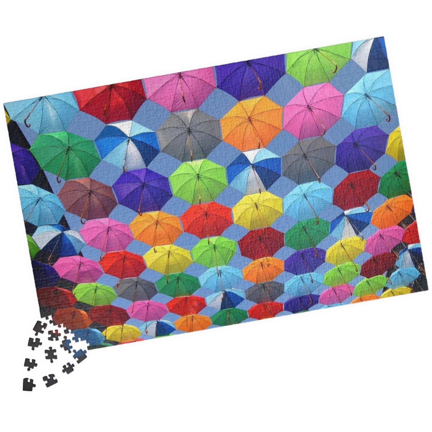Piece together fun on rainy days with our quirky Colorful Umbrella's Puzzle! With 110 to 1014 pieces, this puzzle will keep you entertained for hours. Perfect for all ages, this colorful puzzle makes for a great addition to your rainy day activities.
