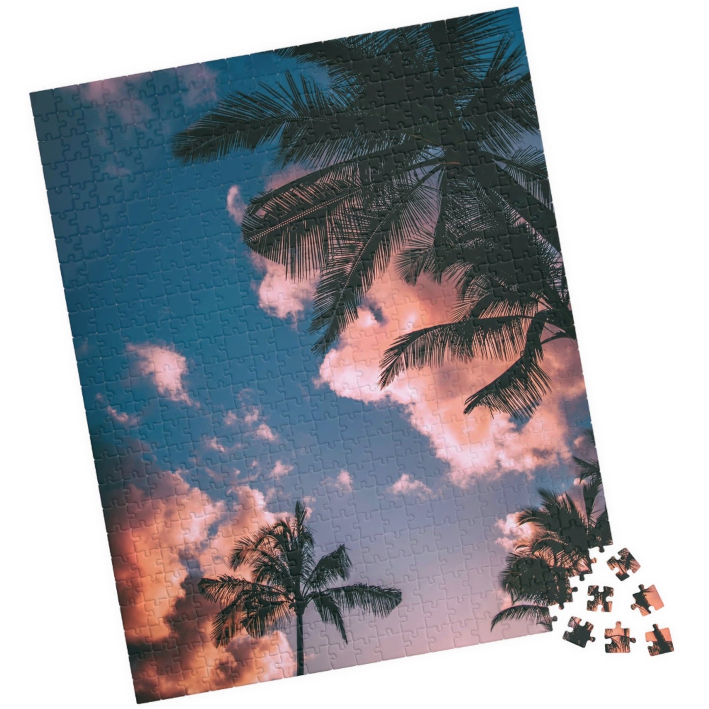 Indulge in the ultimate luxury puzzle experience with our Pink Clouds Palm Trees Puzzle. With 110 to 1014 pieces, this puzzle features a dreamy pink sky and lush palm trees, transporting you to a world of relaxation. Perfect for both puzzle enthusiasts and art lovers, this puzzle is a must-have for your collection.