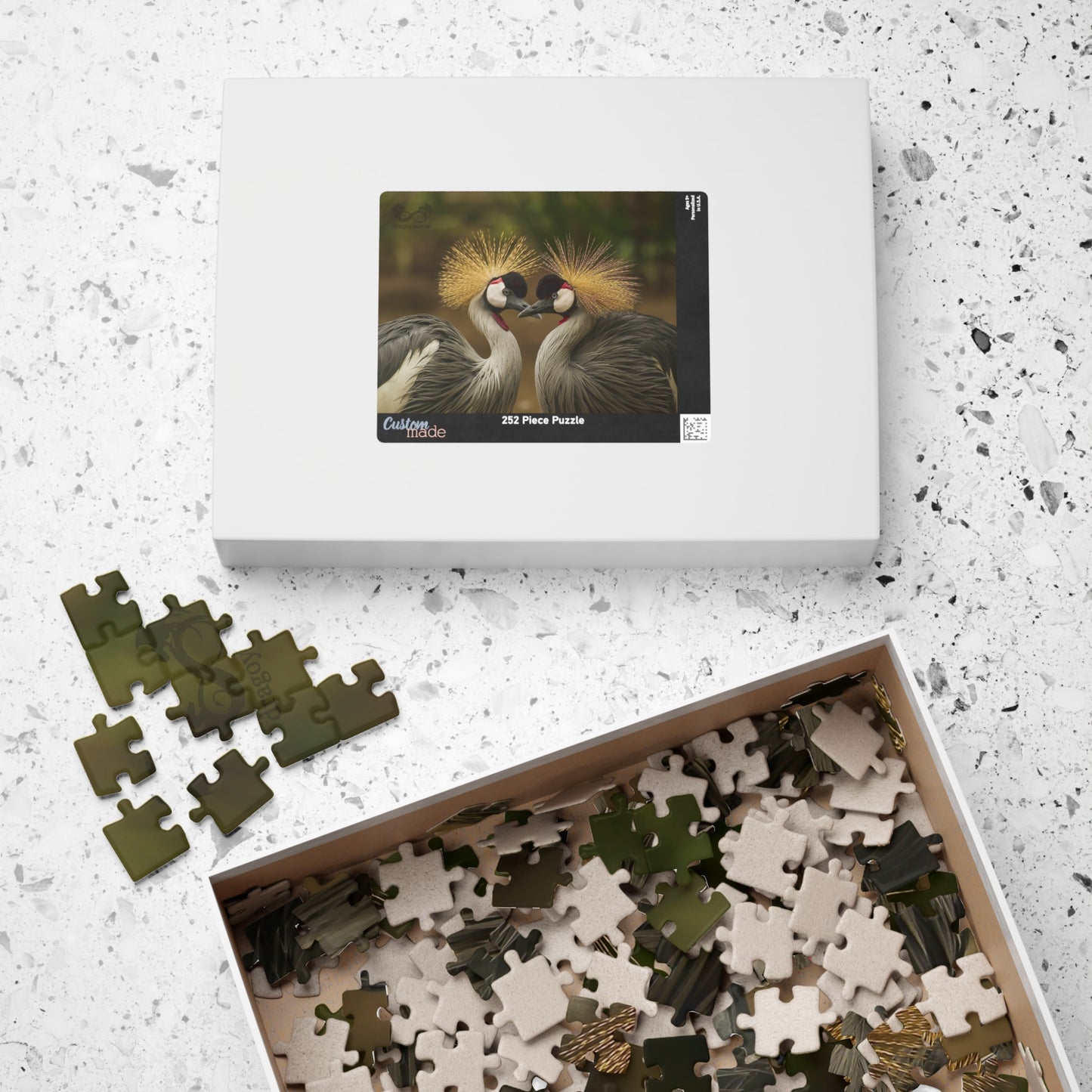 Discover the beauty of East Africa with our Crowned Crane Puzzle! Featuring 110 to 1014 pieces, this puzzle showcases the stunning East African Crowned Crane in all its glory. Piece by piece, you'll be amazed by the intricate details and vibrant colors of this majestic bird. Perfect for puzzle enthusiasts and nature lovers alike!