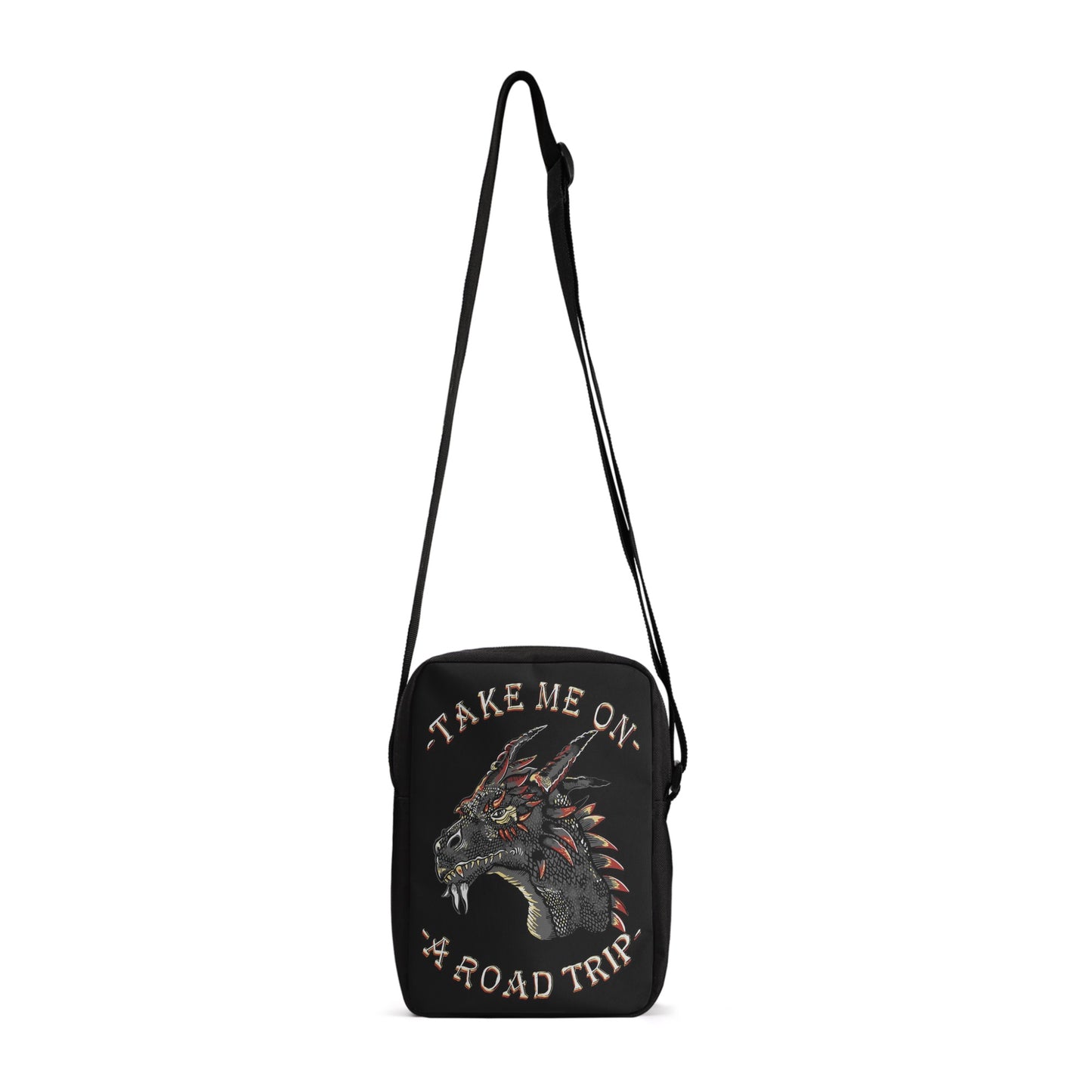 Take your style on the go with the Dragon Road Trip Cross-Body Bag, featuring bold dragon iconography and a spacious interior. This stylish bag has adjustable straps, so you can find your perfect fit effortlessly, while the secure zip-fastening will keep your items safe