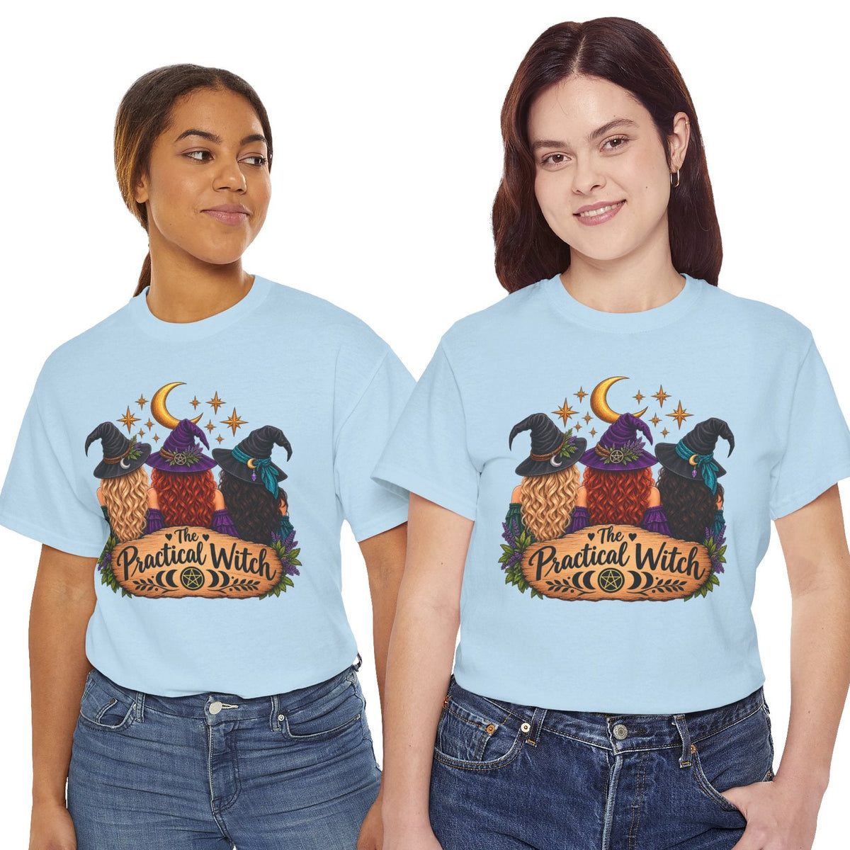 Two women modeling matching light blue graphic T-shirts with a colorful 'The Radical Witch Club' illustration on the front, paired with blue jeans against a plain white background.