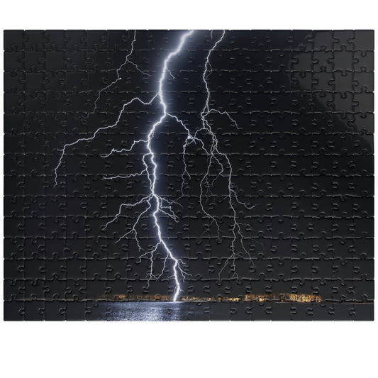 Experience the awe-inspiring beauty of nature with our Lightening Strikes Water Puzzle. This 110 to 1014 piece puzzle features a striking image of a lightning storm over a serene body of water. Challenge your mind and calm your soul with this captivating puzzle.
