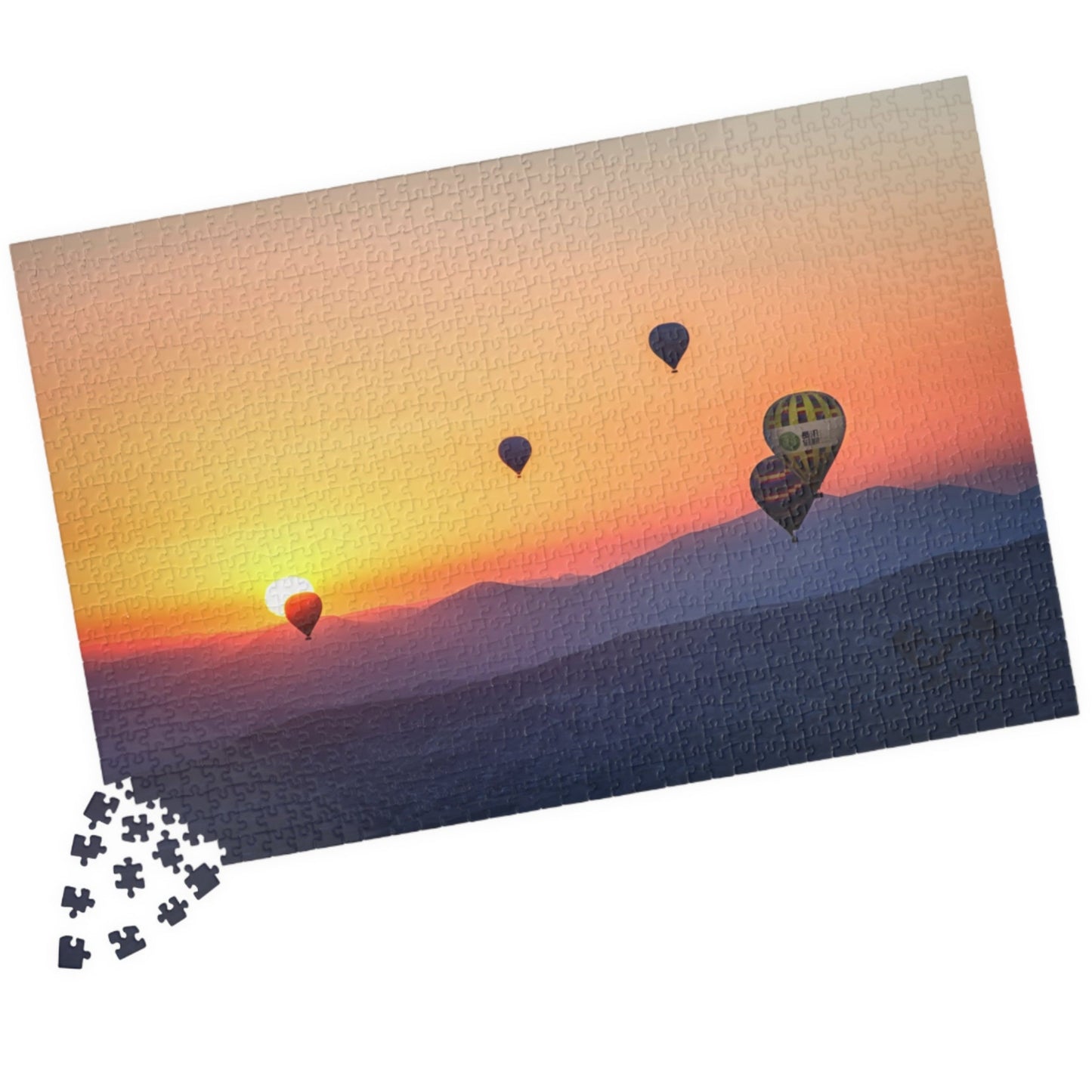 Embark on a journey through the sky with our Hot Air Balloons at Sunset Puzzle. With 110 to 1014 pieces, this puzzle will challenge your mind and soothe your soul. Take in the stunning artistry of the colorful hot air balloons against the dramatic sunset backdrop.