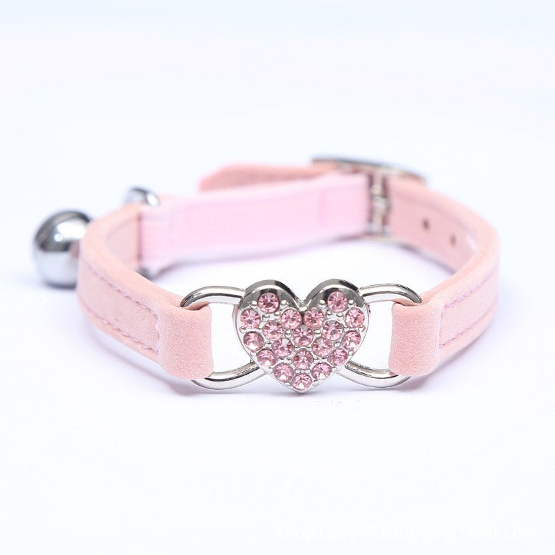 Elevate your furry friend's style with our Medium Crystal Heart Pet Collar with Bell! The sparkling crystal heart adds a touch of elegance while the bell ensures their safety. Give your pet the best of both worlds - fashion and functionality.