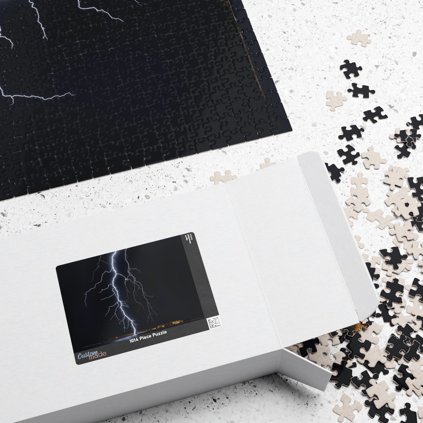 Experience the awe-inspiring beauty of nature with our Lightening Strikes Water Puzzle. This 110 to 1014 piece puzzle features a striking image of a lightning storm over a serene body of water. Challenge your mind and calm your soul with this captivating puzzle.