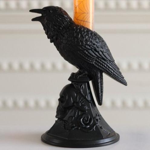 34571cb2530881c36aea103e56134e6a Dare to light up your Halloween with our Crow Candle Stick Light! This unique centerpiece features a creepy crow perched on a candle stick, adding a touch of spooky sophistication to your decor. Enhance the eerie ambiance and thrill your guests with this bold addition. Order now!