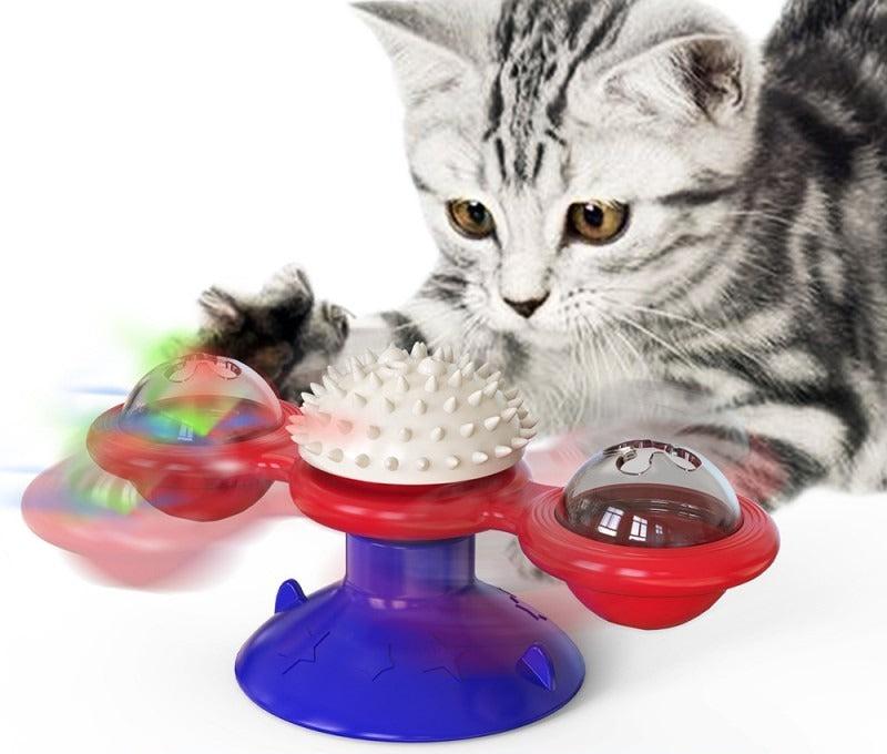 28d2c1318d4f96962afbb41de019a573 Watch as your cat paws at the windmill, keeping them active and engaged. No more hairball boredom, just playful feline fun!
