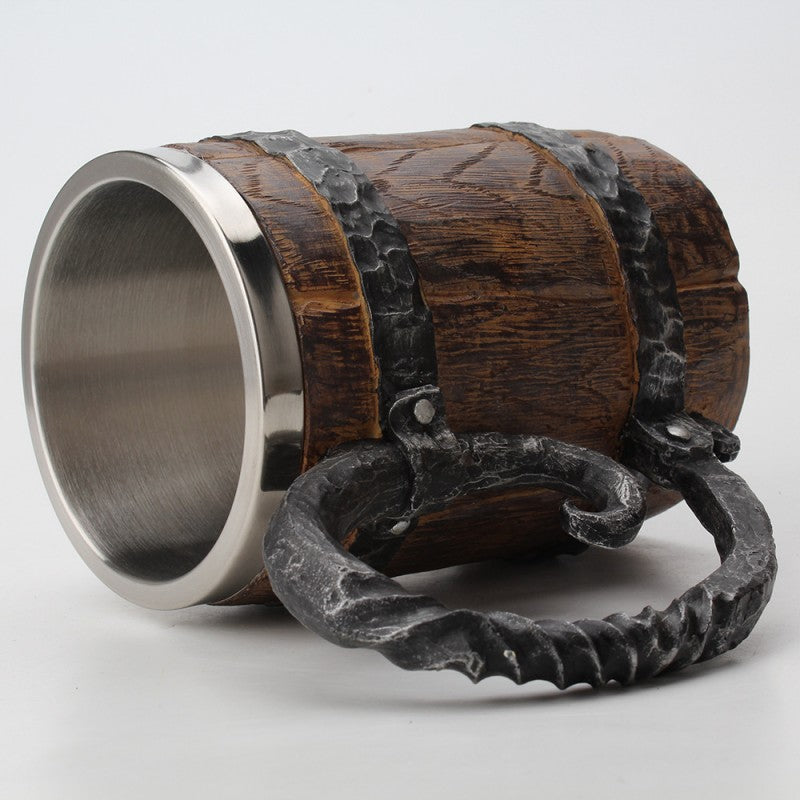 Unleash your inner medieval warrior with our Stainless Steel Medieval Mug! Made with durable stainless steel, it is perfect for all your hot or cold beverages. Its sleek design and sturdy handle make it easy to hold, while its stainless steel material keeps drinks at the perfect temperature.