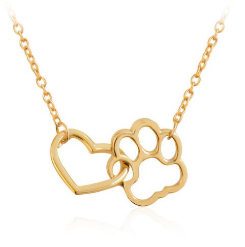 Capture the love and loyalty of your furry friend with our Heart Cat or Dog Footprint Necklace. This beautiful necklace features a heart pendant with a delicate paw print design, reminding you of the unconditional love and companionship of your pet. Show off your love with this unique accessory!