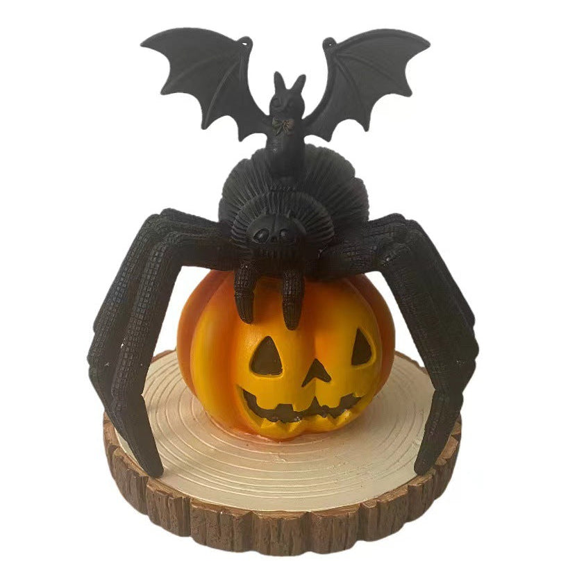 Bring a daring touch to your Halloween décor with this striking resin decoration featuring a menacing spider poised on a vibrant pumpkin.