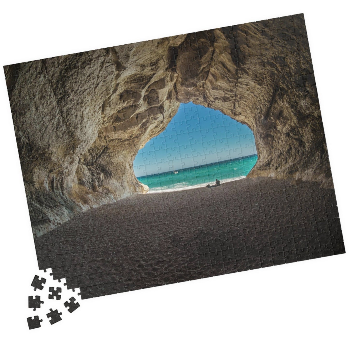 Unleash your inner adventurer with our Cave At The Beach puzzle! This quirky puzzle features 110 to 1014 pieces that will challenge and entertain you for hours. Escape to the beach and get lost in the beautiful and mysterious cave depicted in this puzzle.