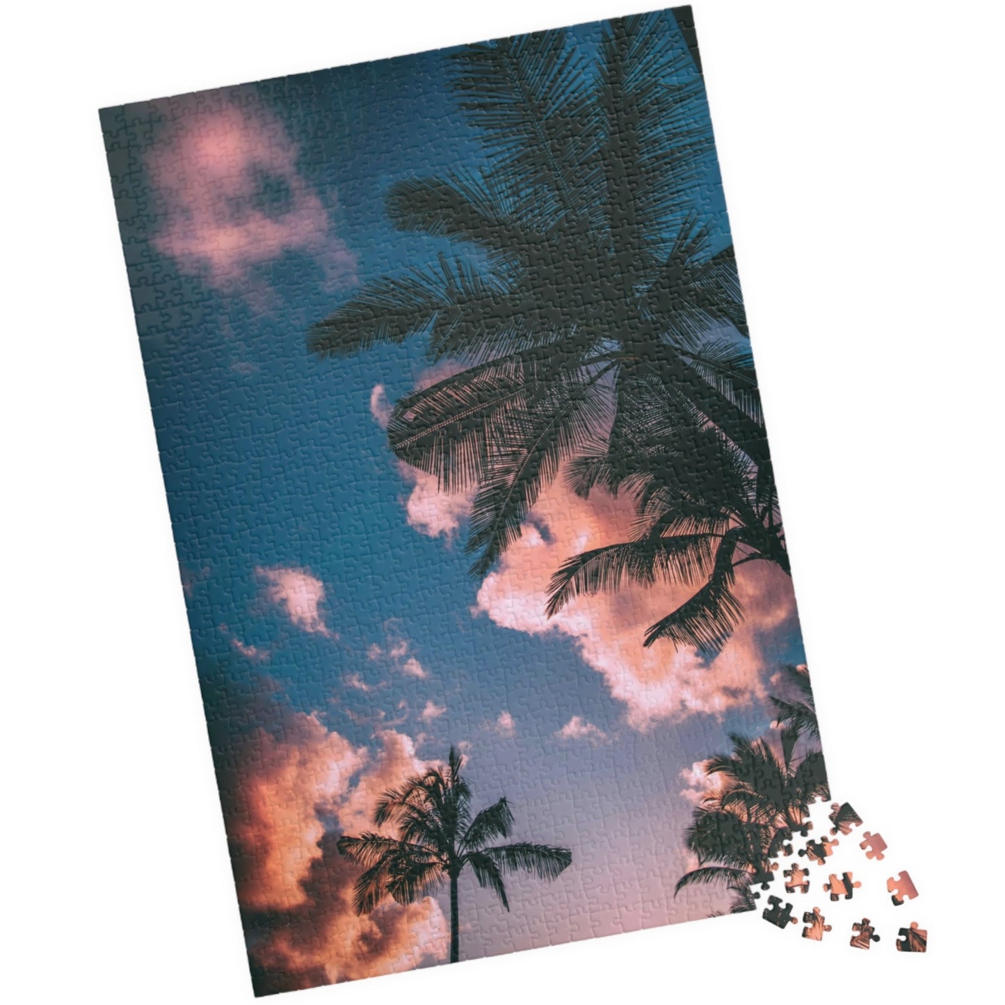Indulge in the ultimate luxury puzzle experience with our Pink Clouds Palm Trees Puzzle. With 110 to 1014 pieces, this puzzle features a dreamy pink sky and lush palm trees, transporting you to a world of relaxation. Perfect for both puzzle enthusiasts and art lovers, this puzzle is a must-have for your collection.