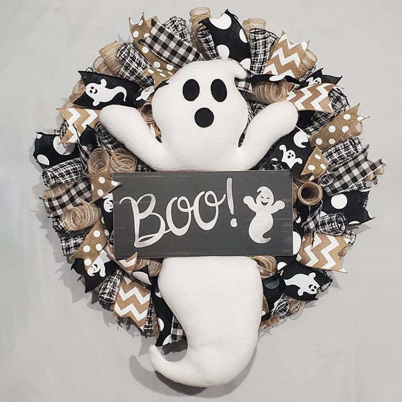 Add a spooky twist to your Halloween decor with this Cute Halloween Ghost Boo Wreath. Featuring playful ghost accents and a bold "Boo" message, it captures the fun and eerie spirit of the season, making your entrance unforgettable.