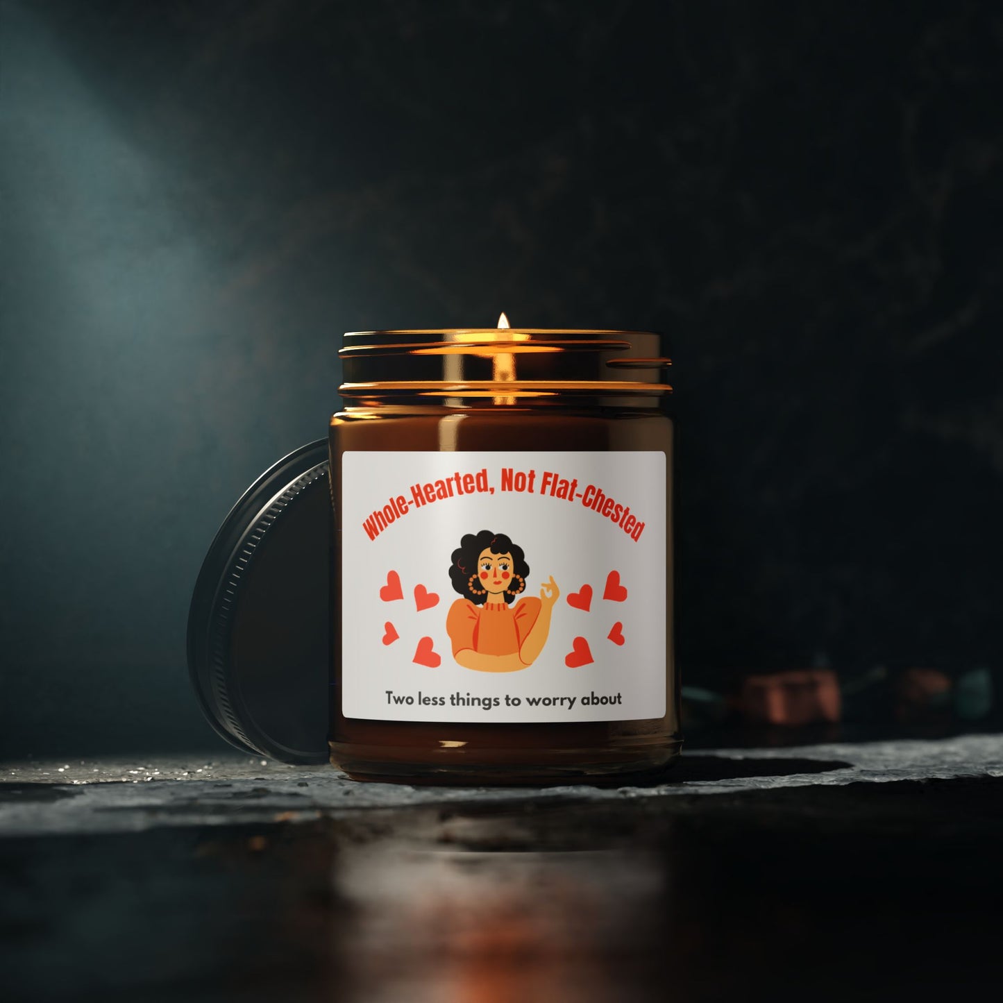 Candle in a jar with a label featuring an illustration and text on a dark background