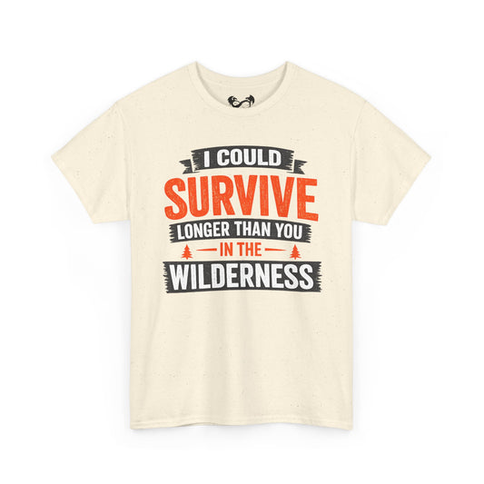 An off-white crewneck t-shirt with a graphic print that reads 'I COULD SURVIVE LONGER THAN YOU IN THE WILDERNESS' in orange, black, and white lettering, displayed on a clean white background.