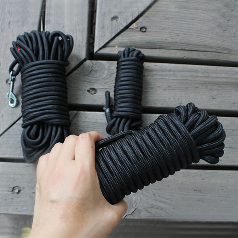 Outfit your pup in style with this long black nylon dog training leash. Crafted from durable materials, this leash is designed to last. Its adjustable length ensures you have the ideal fit and control for any training needs.