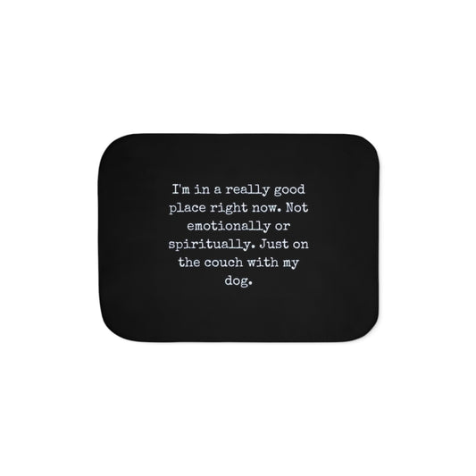 Black mouse pad with white text on a white background