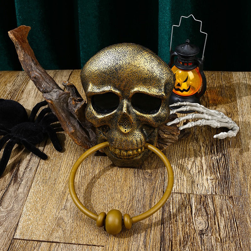 Make a bold statement this Halloween with the Halloween Skull Door Knocker. Crafted to catch attention, this striking decoration adds a spooky touch to your front door while serving as a functional knocker. Its detailed skull design creates an eerie atmosphere that sets the perfect mood for your Halloween festivities.