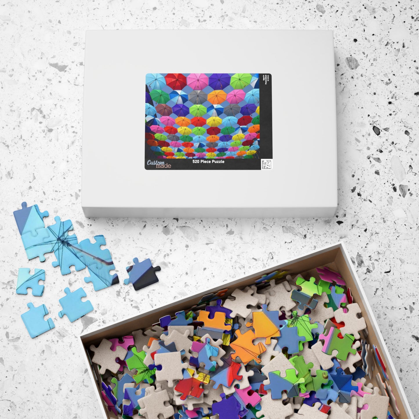 Piece together fun on rainy days with our quirky Colorful Umbrella's Puzzle! With 110 to 1014 pieces, this puzzle will keep you entertained for hours. Perfect for all ages, this colorful puzzle makes for a great addition to your rainy day activities.