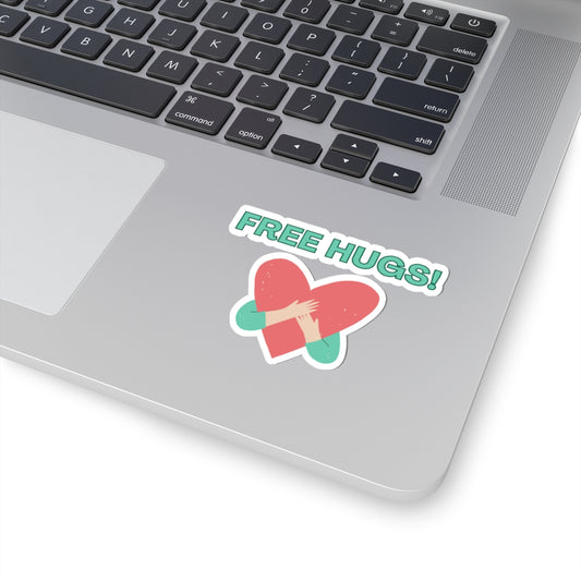 Laptop with a 'FREE HUGS!' sticker on the palm rest area