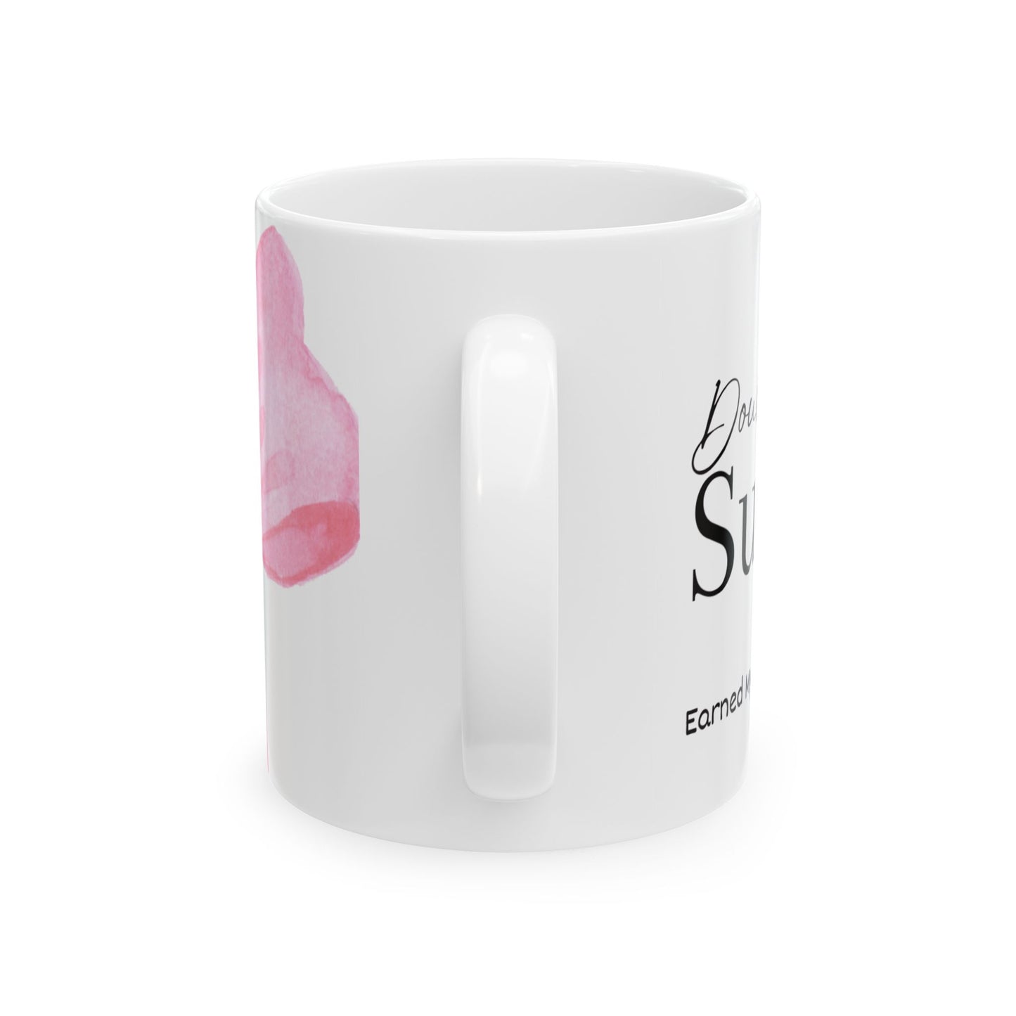 White mug with pink design and text on a white background