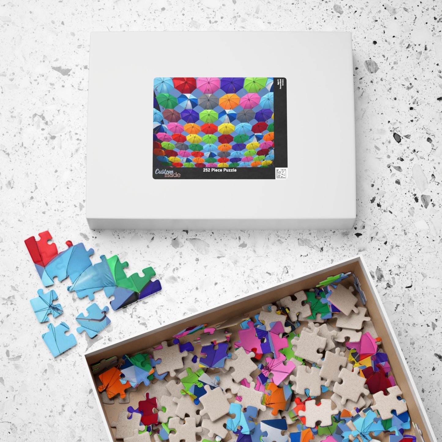 Piece together fun on rainy days with our quirky Colorful Umbrella's Puzzle! With 110 to 1014 pieces, this puzzle will keep you entertained for hours. Perfect for all ages, this colorful puzzle makes for a great addition to your rainy day activities.