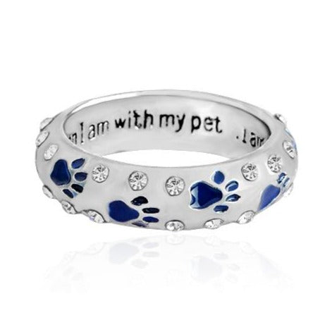 Capture the heartwarming bond between you and your furry best friend with our Dog Paw Prints Jewels Ring. This beautifully crafted ring features delicate paw prints, representing the unbreakable connection between you and your beloved dog. A must-have for any dog lover, this ring makes the perfect accessory to express your love and devotion.