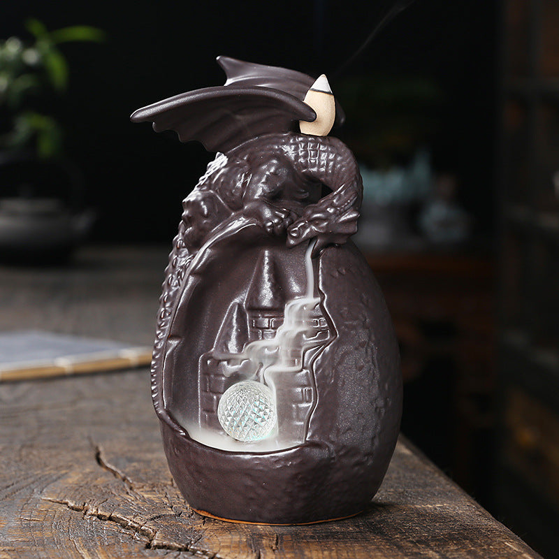 Transform your space into a tranquil oasis with our European Ceramic Dragon Back Flow Incense Burner. The intricately designed dragon allows for a mesmerizing back flow effect, providing a soothing and calming atmosphere. Perfect for relaxation, meditation, or adding a touch of elegance to any room.