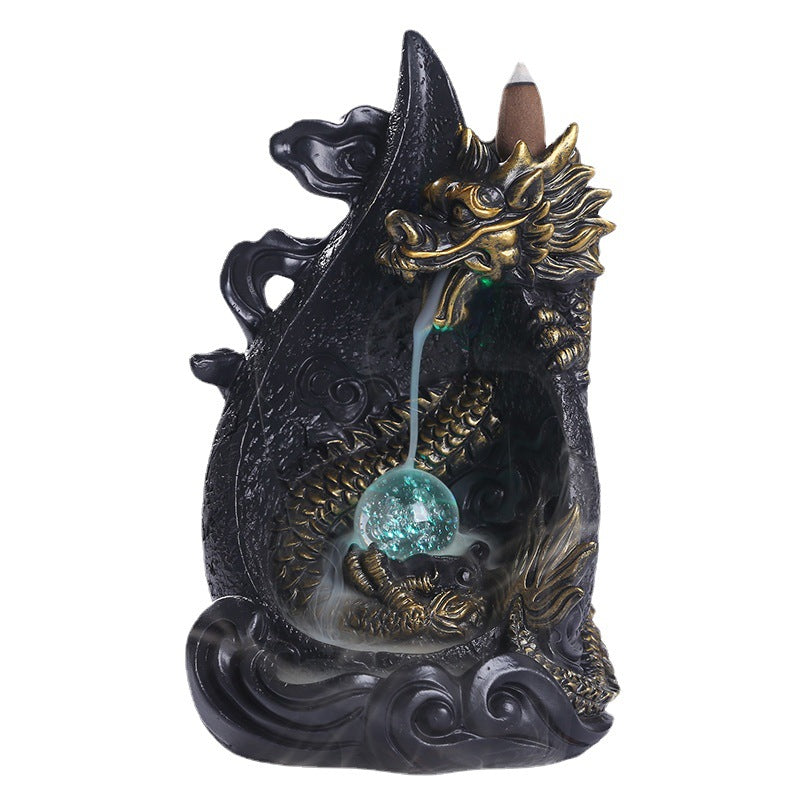 This gorgeous LED Backflow Dragon Incense Burner is handcrafted to instantly add a beautiful, illuminated touch of elegance to your home. Enjoy stunning visual displays while creating a calming atmosphere.