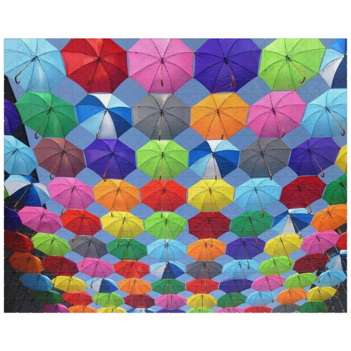 Piece together fun on rainy days with our quirky Colorful Umbrella's Puzzle! With 110 to 1014 pieces, this puzzle will keep you entertained for hours. Perfect for all ages, this colorful puzzle makes for a great addition to your rainy day activities.