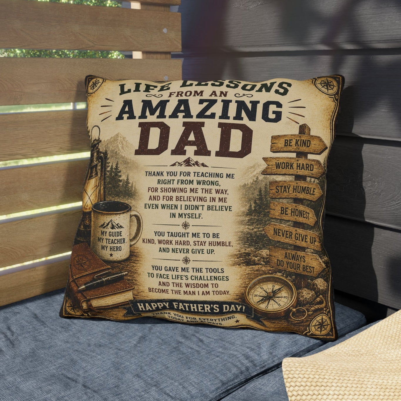 Decorative pillow with 'Amazing Dad' text on a cushioned bench outdoors.