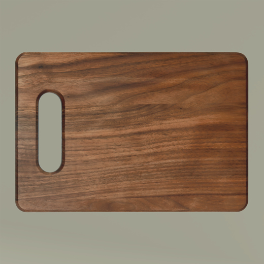 Wooden cutting board with a handle on a beige background