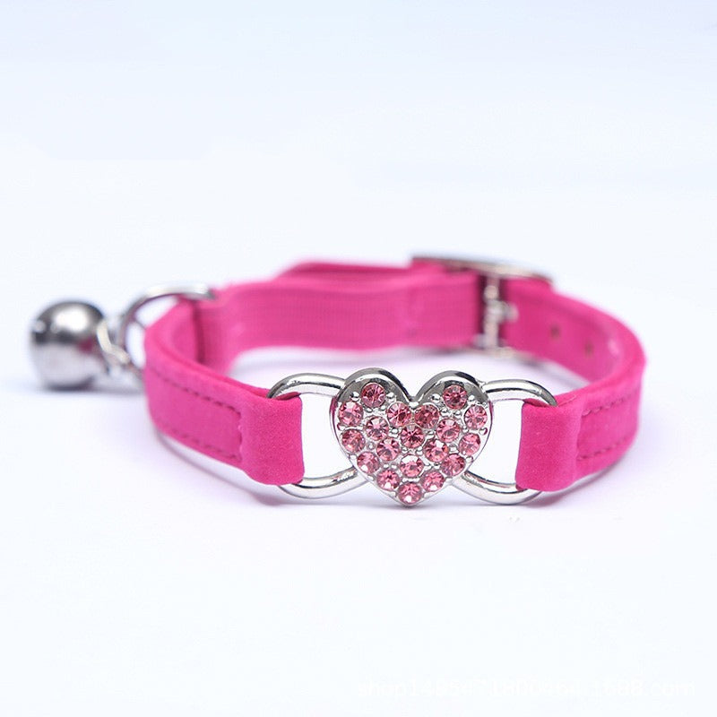 Elevate your furry friend's style with our Medium Crystal Heart Pet Collar with Bell! The sparkling crystal heart adds a touch of elegance while the bell ensures their safety. Give your pet the best of both worlds - fashion and functionality.