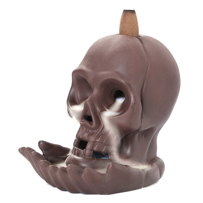 Elevate your space with the Aromatherapy Skull Dragon Backflow Incense Burner. This striking piece combines dramatic skull and dragon motifs to create a captivating focal point.