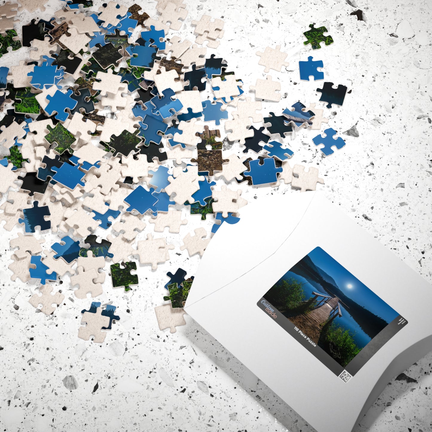 Experience the calming beauty of the Blue Moon At The Lake Puzzle. With 110 to 1014 pieces, this puzzle is perfect for all levels. Immerse yourself in the artistry of the blue moon reflecting on the serene lake, and feel the peace and tranquility it brings. A delightful challenge for any puzzle enthusiast.