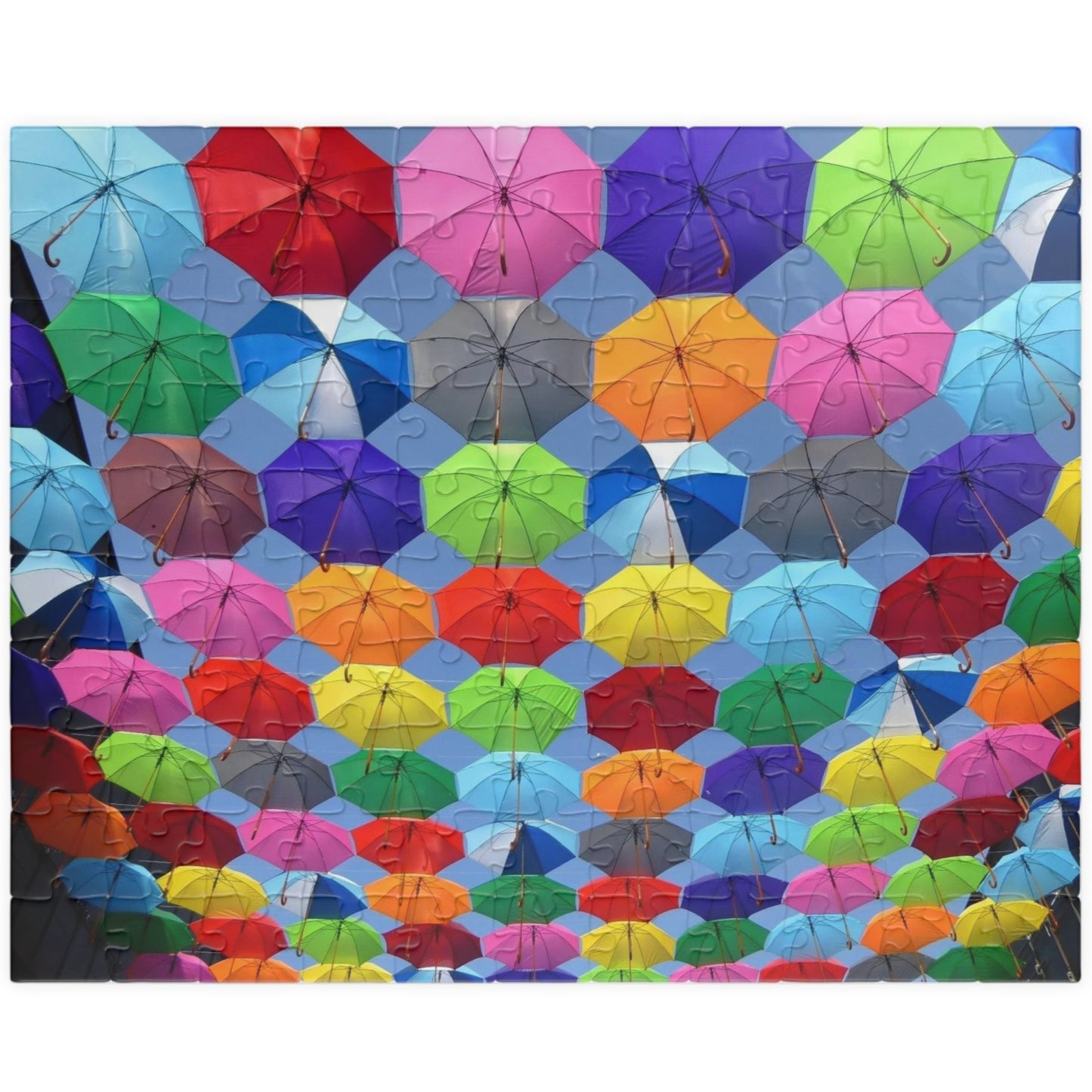 Piece together fun on rainy days with our quirky Colorful Umbrella's Puzzle! With 110 to 1014 pieces, this puzzle will keep you entertained for hours. Perfect for all ages, this colorful puzzle makes for a great addition to your rainy day activities.