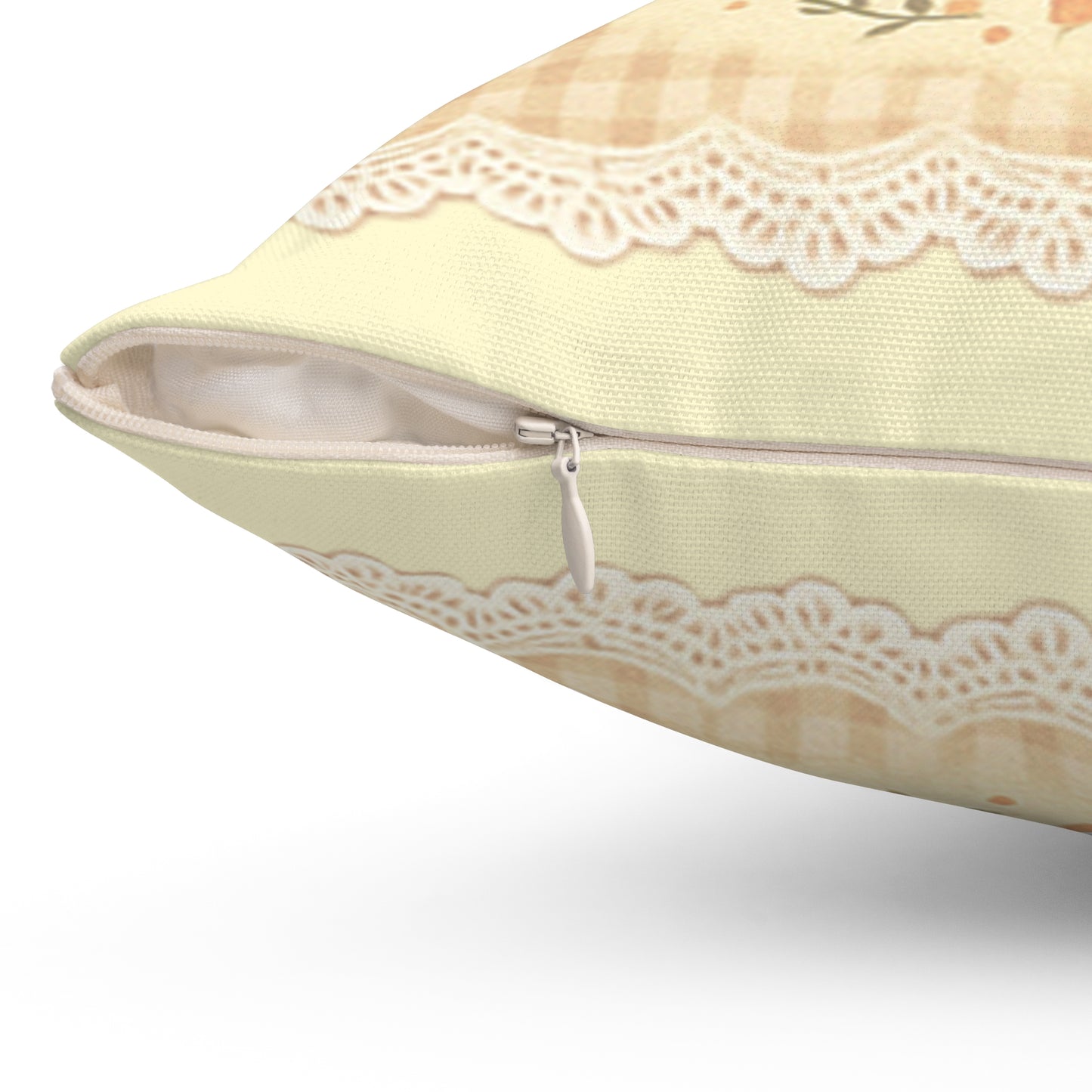 Light green pillow with lace trim on a white background