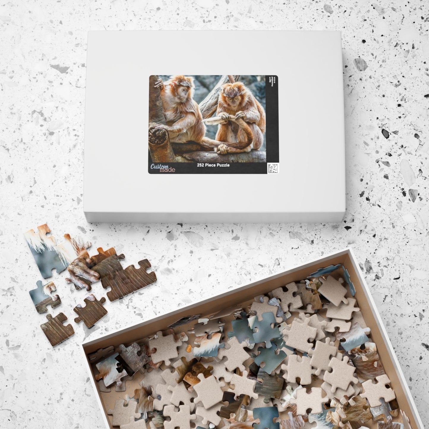 Get ready for endless fun with the Two Adorable Monkeys Puzzle! Featuring two playful monkeys in a stunning 110 to 1014 piece puzzle, this quirky and humorous puzzle is perfect for anyone who doesn't take themselves too seriously. With unique word play, double meanings, and a playful tone, this puzzle is sure to provide hours of entertainment.
