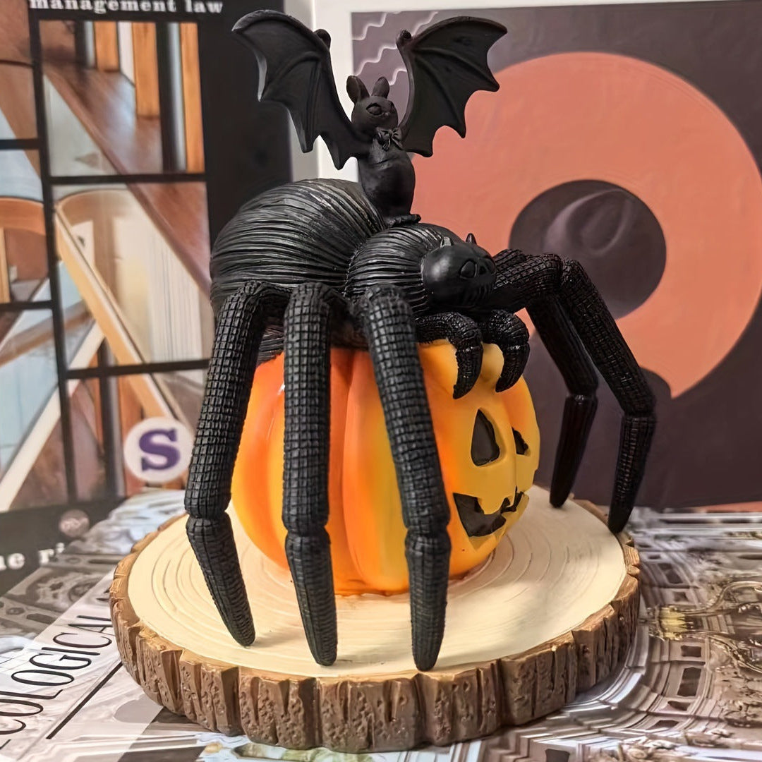 Bring a daring touch to your Halloween décor with this striking resin decoration featuring a menacing spider poised on a vibrant pumpkin.